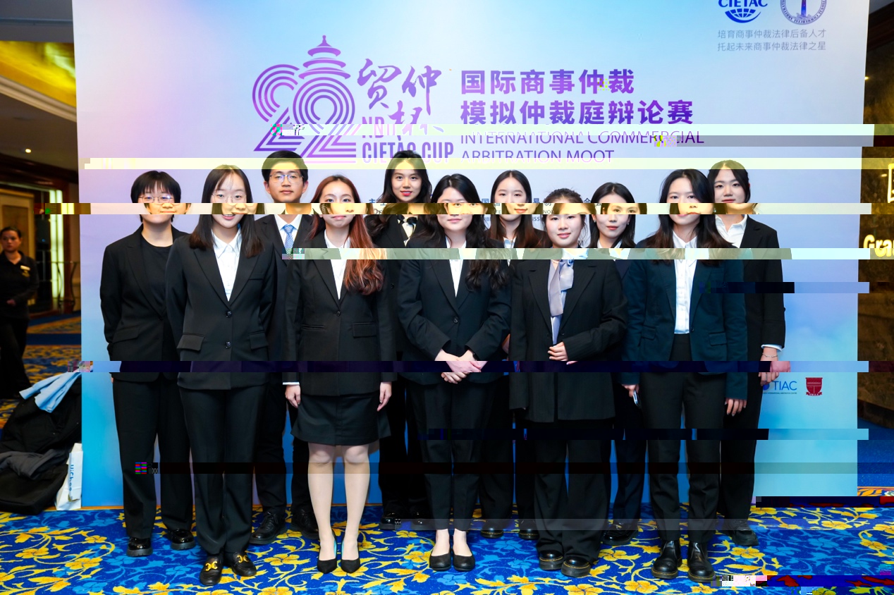 A group of people standing togetherDescription automatically generated